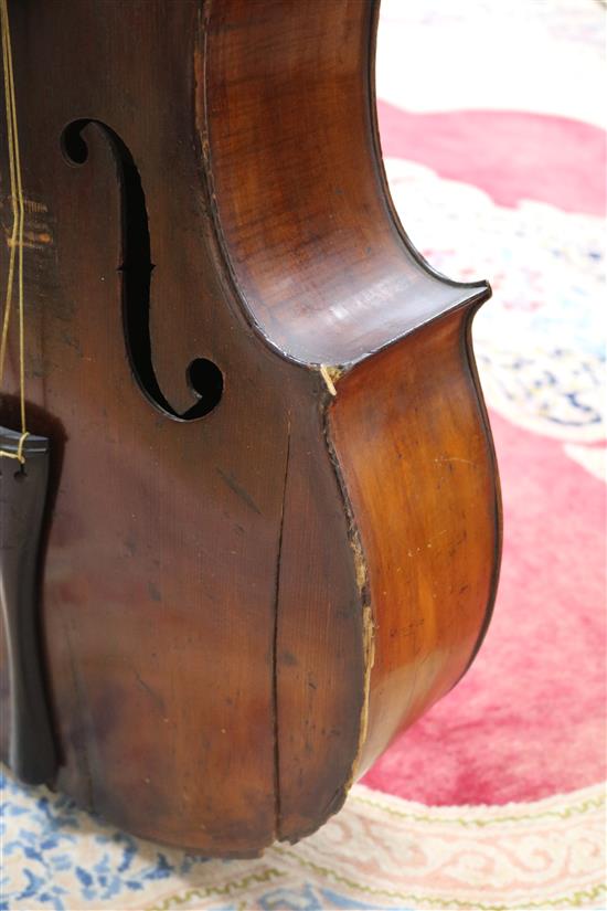 A full sized cello bearing label Arthur Richardson ... and two bows (one silver mounted), the other signed Wilhelm ... uhl